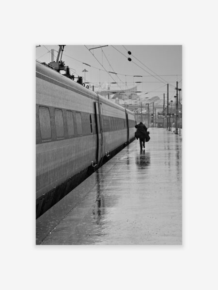 black and white photo train station